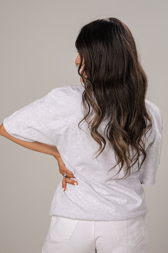 Woman wearing a Clemson t-shirt against a plain background