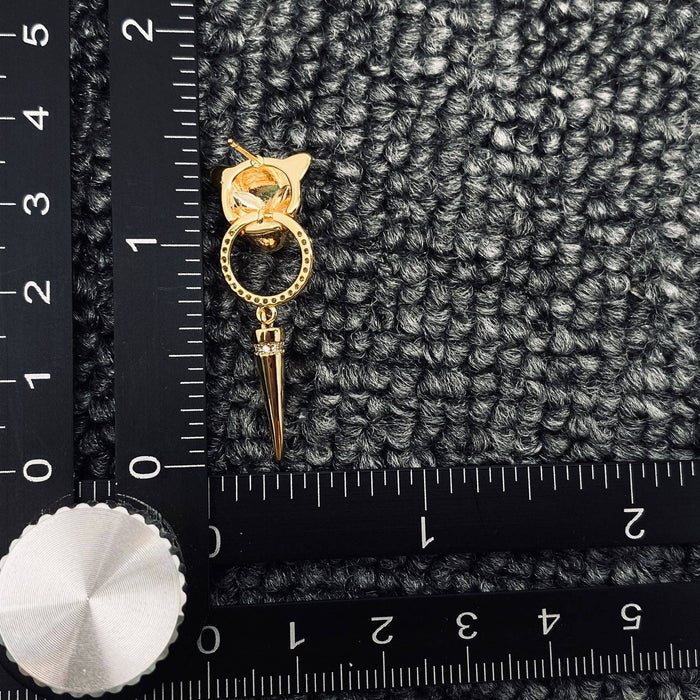 Mio Queena leopard head earrings featuring detailed gold-tone leopard designs on silver hooks, stylish and bold accessory.