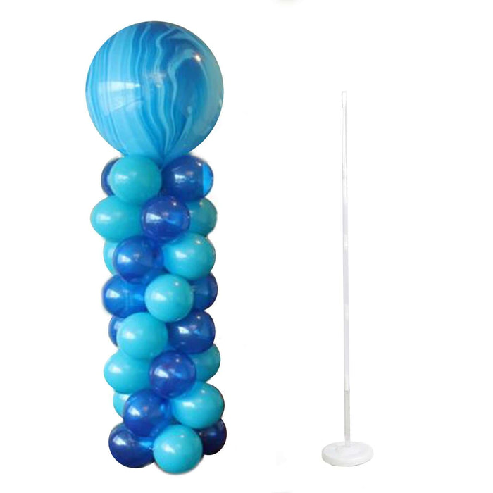 Blue marble balloon column with blue balloons and a stand