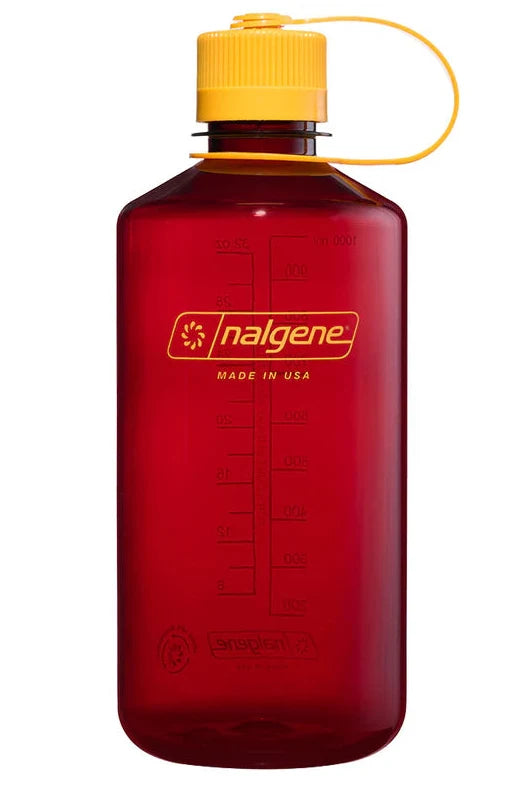 Red Nalgene bottle with yellow cap on a white background