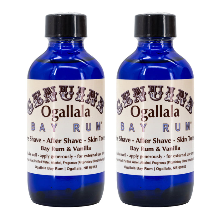 Two bottles of Genuine Ogallala Bay Rum on a white background