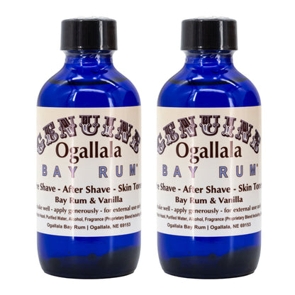 Two bottles of Genuine Ogallala Bay Rum on a white background