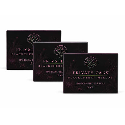 Three rectangular boxes of Private Oaks Blackberry Merlot Handcrafted Bar Soap arranged in a staggered row on a plain white background.