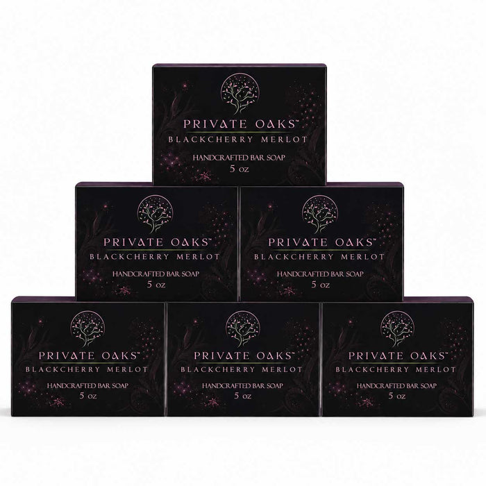 Six boxes of Private Oaks Blackberry Merlot Handcrafted Bar Soap arranged in a pyramid stack on a plain white background.
