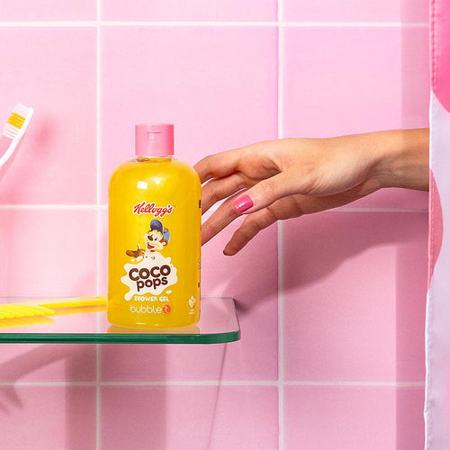 bubble t kellogg’s coco pops shower gel bottle on bathroom shelf, chocolate scented body wash