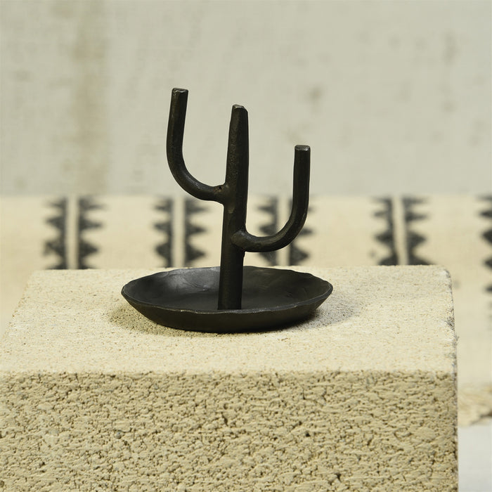 Black cactus-shaped ring holder with three prongs on a round base