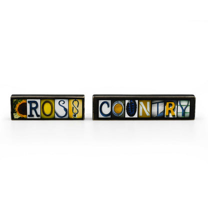 Two rectangular signs with 'ROSS COUNTRY' text on a white background