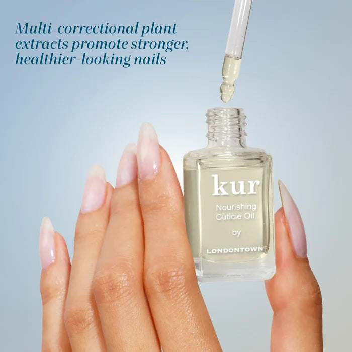 A hand holds a glass bottle of Cuticle Refresh by LONDONTOWN, with a dropper releasing oil. Text reads: “Plant extracts provide essential cuticle care for stronger, healthier-looking nails.”.