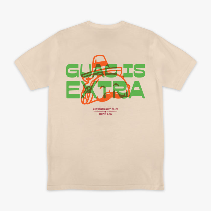 Beige t-shirt with 'Guac is Extra' graphic design on a white background