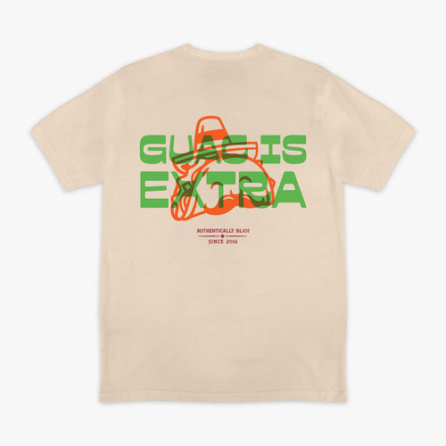 Beige t-shirt with 'Guac is Extra' graphic design on a white background