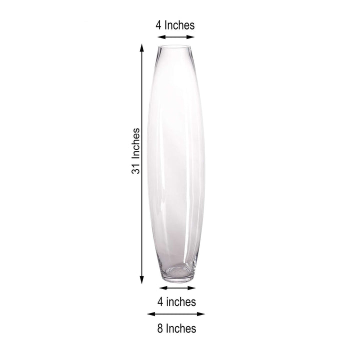 Tall glass vase, 31 inches high, 4 inches wide, 8 inches base diameter.