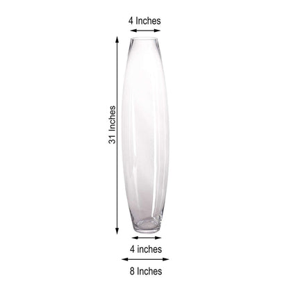 Tall glass vase, 31 inches high, 4 inches wide, 8 inches base diameter.