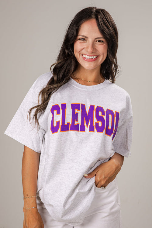 Woman wearing a Clemson t-shirt against a plain background