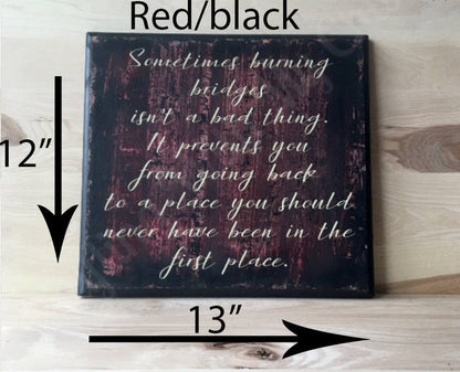 13x12 red/black inspirational sign with cream lettering.