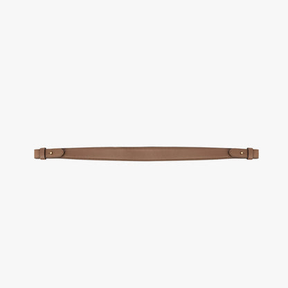Detachable shoulder strap for STOW London's Curve, Midi Curve and East West in Mocha smooth leather on a light grey background featuring gold hardware