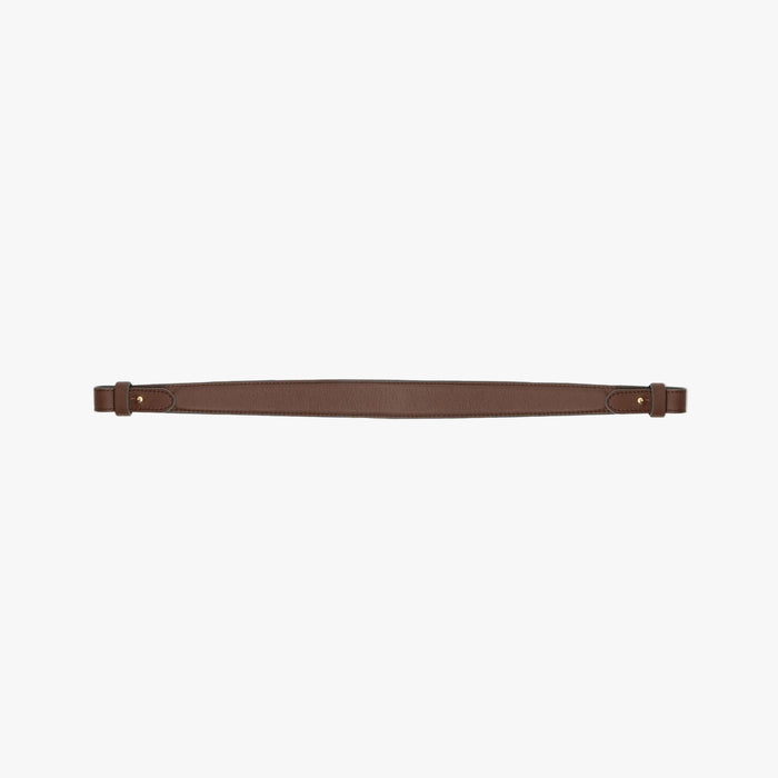 Detachable shoulder strap for STOW London's Curve, Midi Curve and East West in Chocolate smooth leather on a light grey background featuring gold hardware