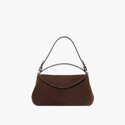 STOW London's East West in Chocolate suede leather on a light grey background featuring the detachable shoulder strap and top handle with gold hardware