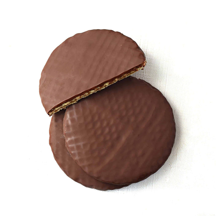 Two chocolate-covered wafers on a white background