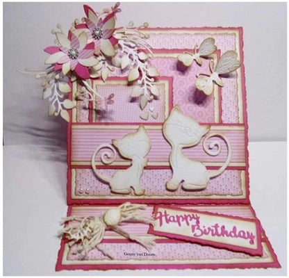 Nellie's Choice - Shape Dies Blue - Strangled Branches with Flowers. This die will cut a circular branch with flowers and berries, and includes 2 additional flower dies to allow you to cut and layer to add dimension to your project. Includes 3 dies. Size: (branch) 4.2 x 3.7 in (flower 1) 1.6 x 1.6 in (flower 2) 1.1 x 1 in. Available at Embellish Away located in Bowmanville Ontairo Canada. Example by designer.