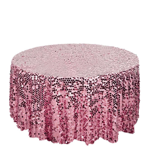 Pink sequin tablecloth with shimmering circular design on a white background.