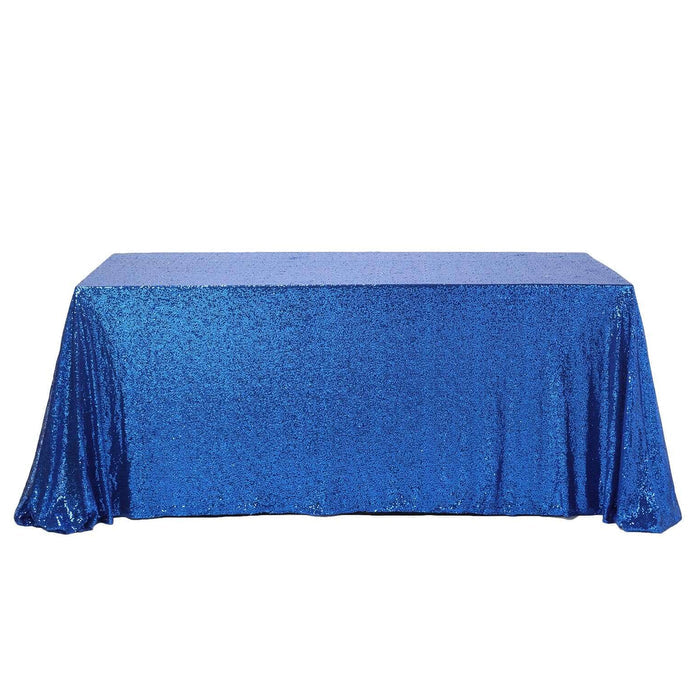 Blue sequin tablecloth draped over a rectangular table