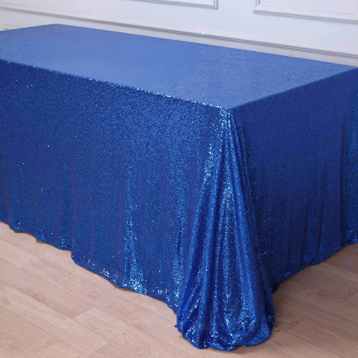 Blue sequin tablecloth draped elegantly over a table.
