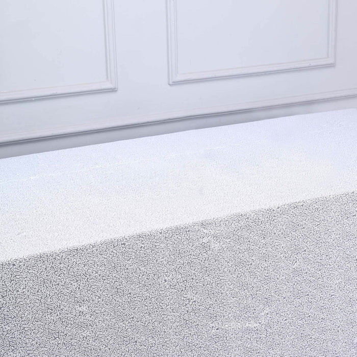 Textured white surface with a subtle pattern, ideal for backgrounds or displays.