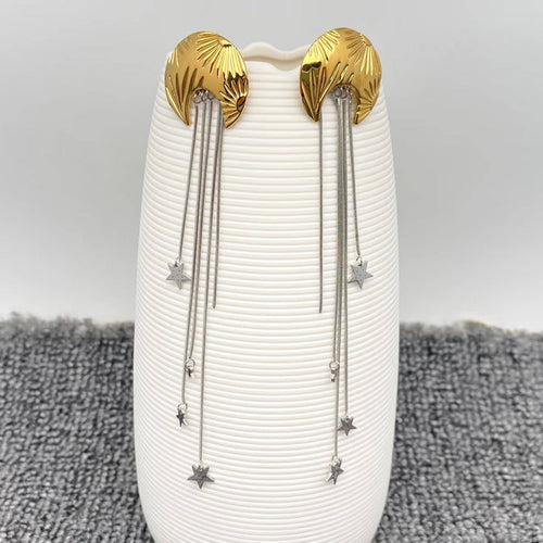 Mio Queena Star Fringe Moon Earrings featuring silver-tone hoops with star and moon charms and fringe detailing.