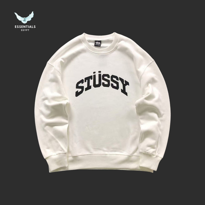 White Stussy sweatshirt on a black background