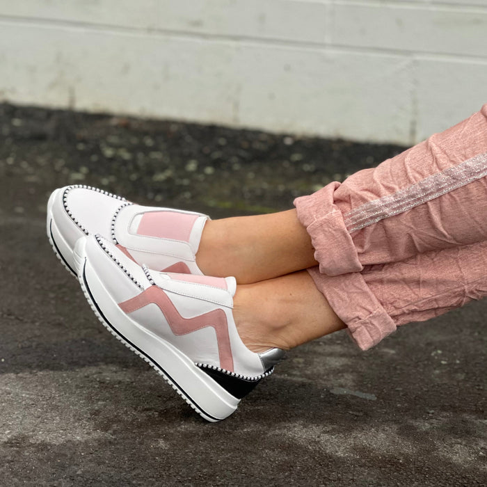 Dressy and sporty trainers with detailed trim. Comfortable slip on sneaker with elasticated gusset. Contoured footbed.