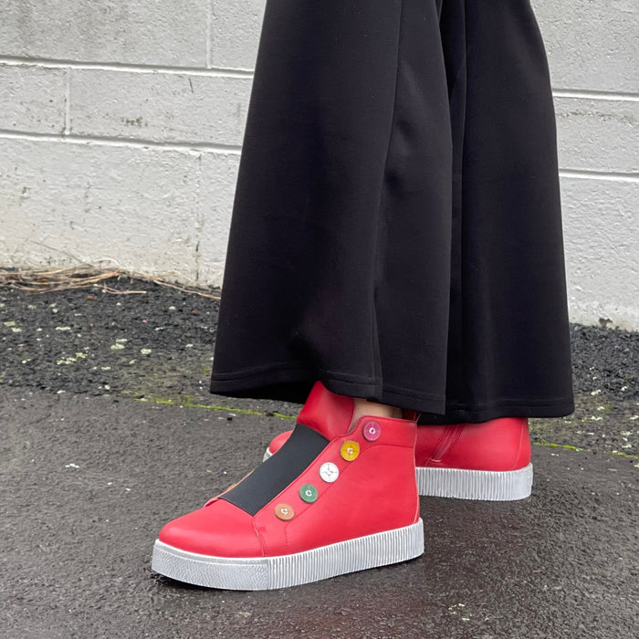 Comfortable red high top sneakers with side zip and elasticated gusset. Quality footwear