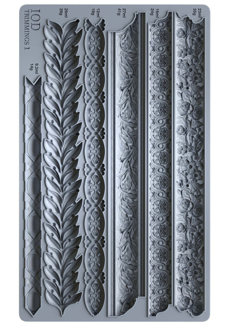 Decorative mold with intricate patterns on a white background