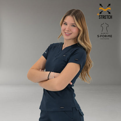 Women’s navy blue 905 scrub top with crossed arms side-front pose