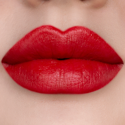 Velvet Matte You Red My Mind red lipstick on lips, light skin tone