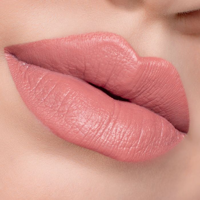 Your Muse rosy pink lipstick on lips, light skin tone close-up